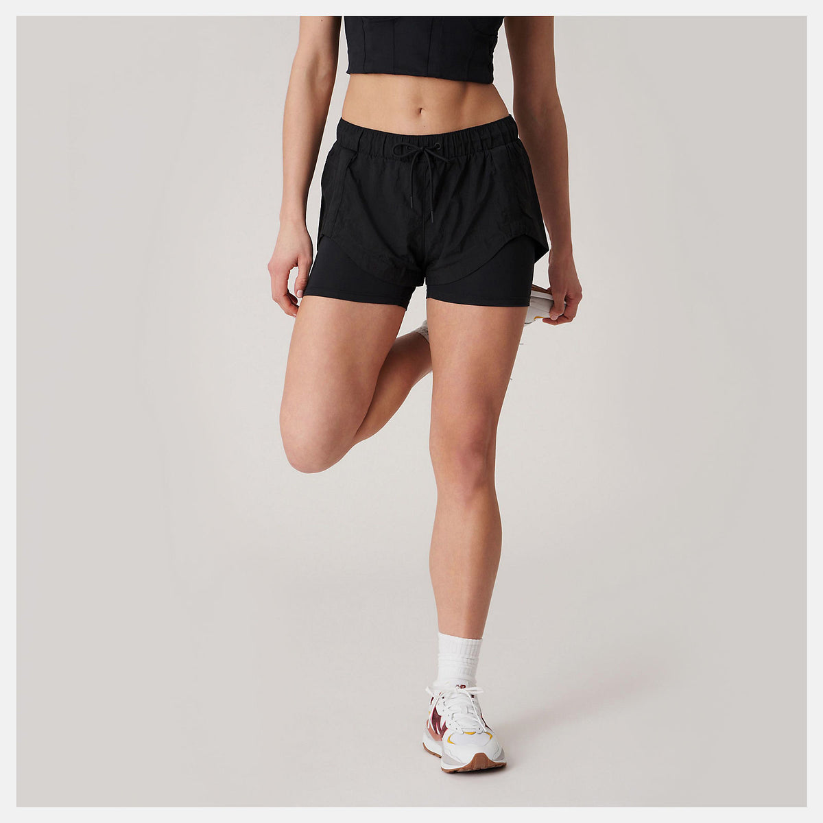 Women New Balance Bandier Woven tech Short