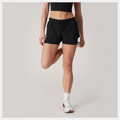 Women New Balance Bandier Woven tech Short