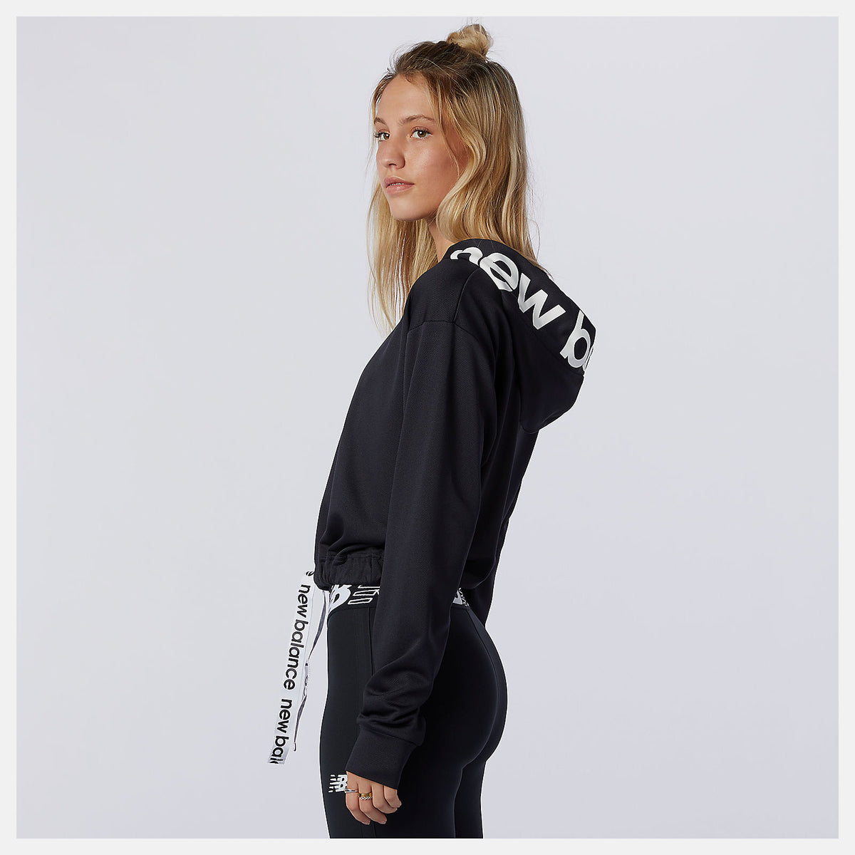 Women New Balance Relentless Cinched Hem Hoodie