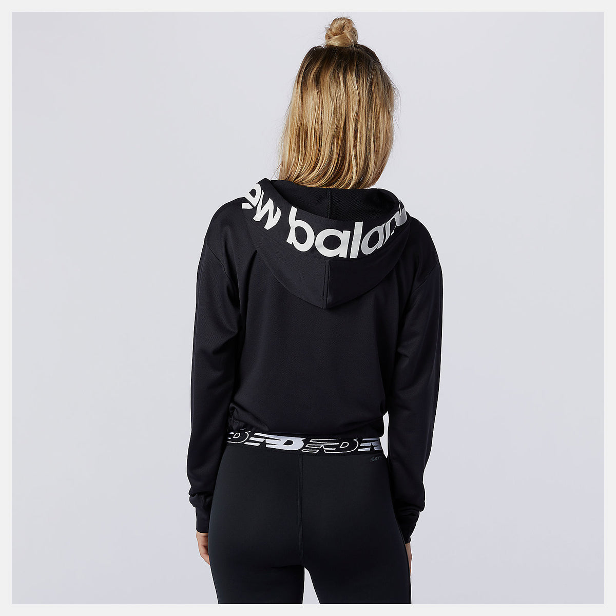 Women New Balance Relentless Cinched Hem Hoodie